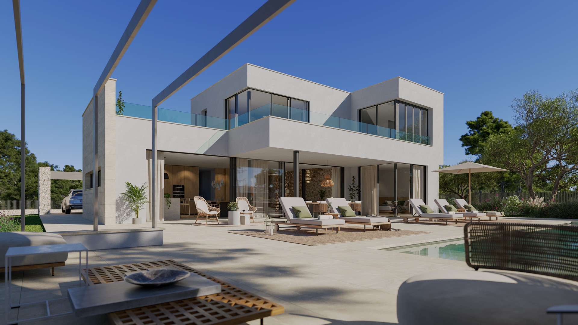 Exterior view of a modern white villa in Son Gual featuring a ground floor terrace, swimming pool, and mountain views.