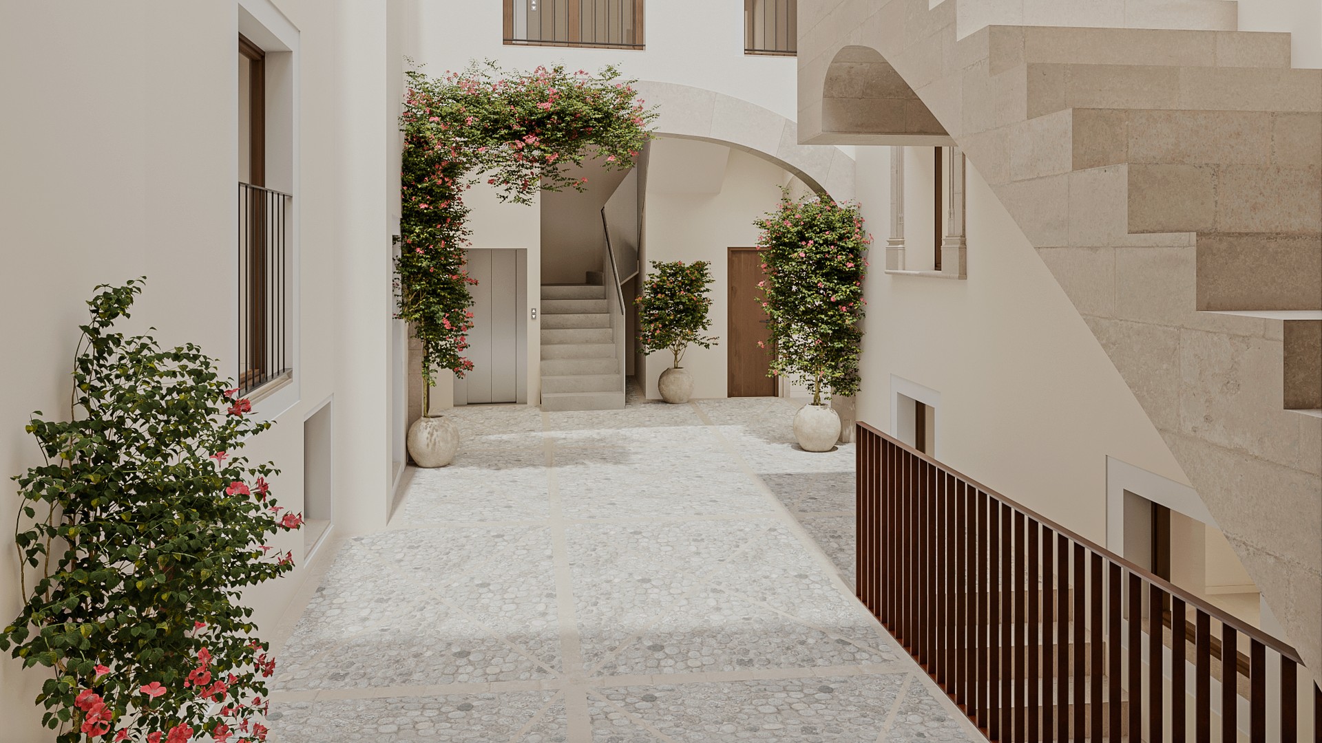 Interior courtyard featuring Marés stone, stone stairs, and greenery within a restored historic building.