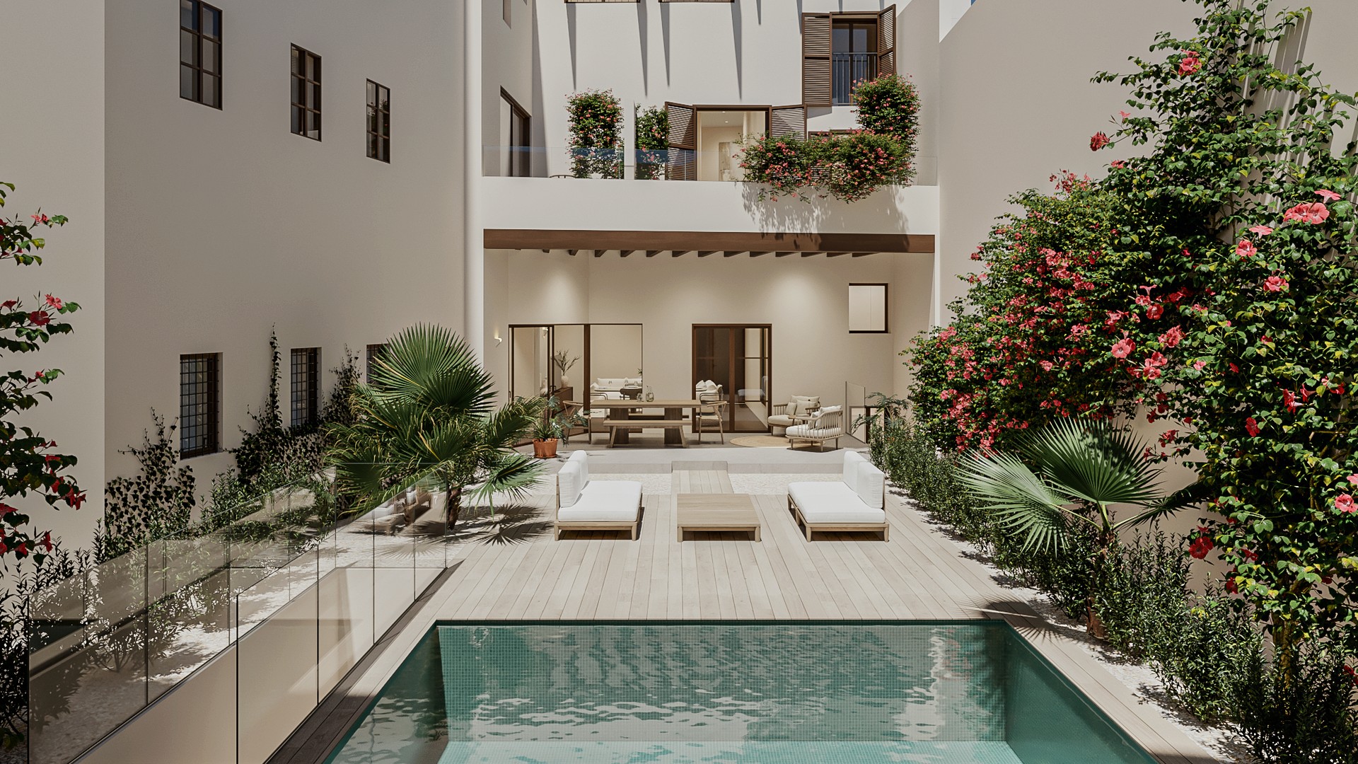 Exterior view of a private apartment courtyard featuring a small swimming pool, covered terrace, and white building facade.