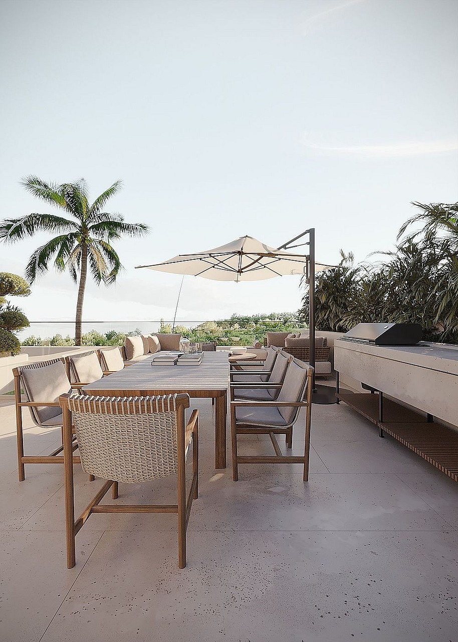 Rooftop terrace with a long outdoor dining table, woven chairs, a cantilever umbrella, and a stone prep area.