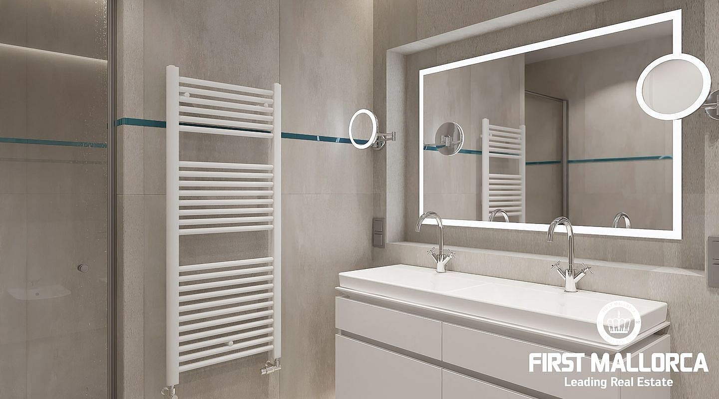 Modern bathroom featuring a double sink vanity, wall-mounted towel warmer, and a large backlit mirror with tile walls.