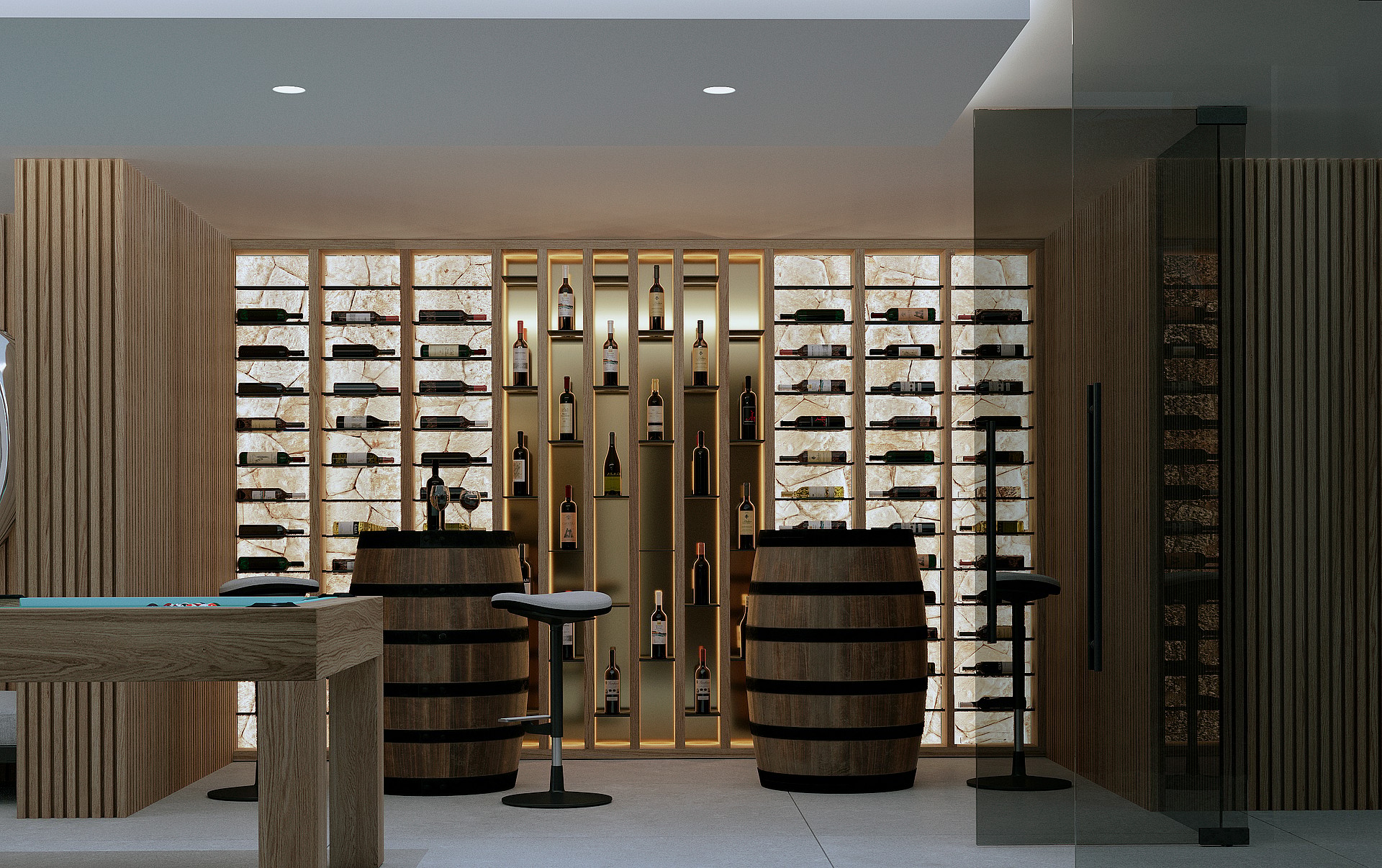 A modern wine cellar featuring backlit stone display walls, two wooden wine barrels used as tables, and bar stools.