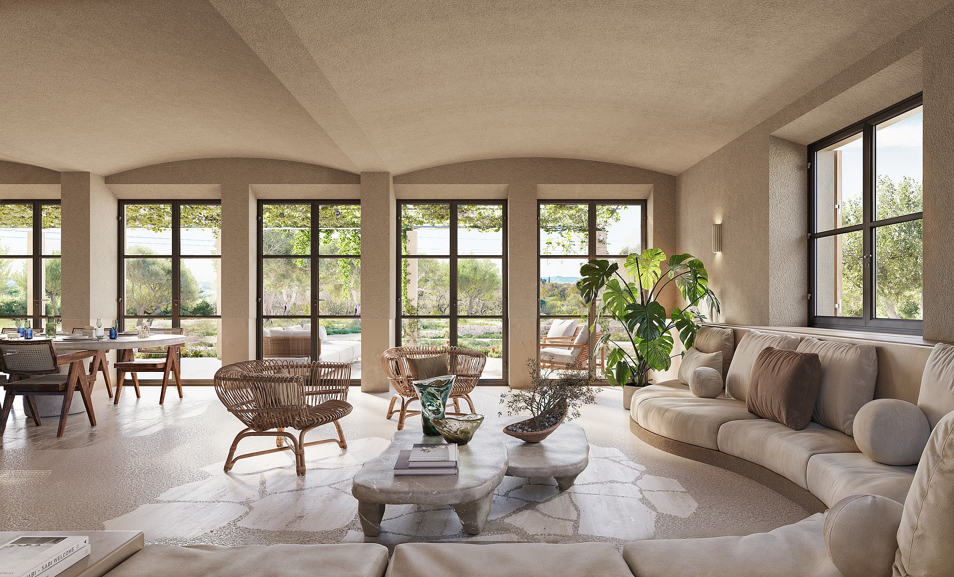 Spacious living room featuring arched textured ceilings, large glass-paned doors, a curved beige sofa, and natural stone flooring.