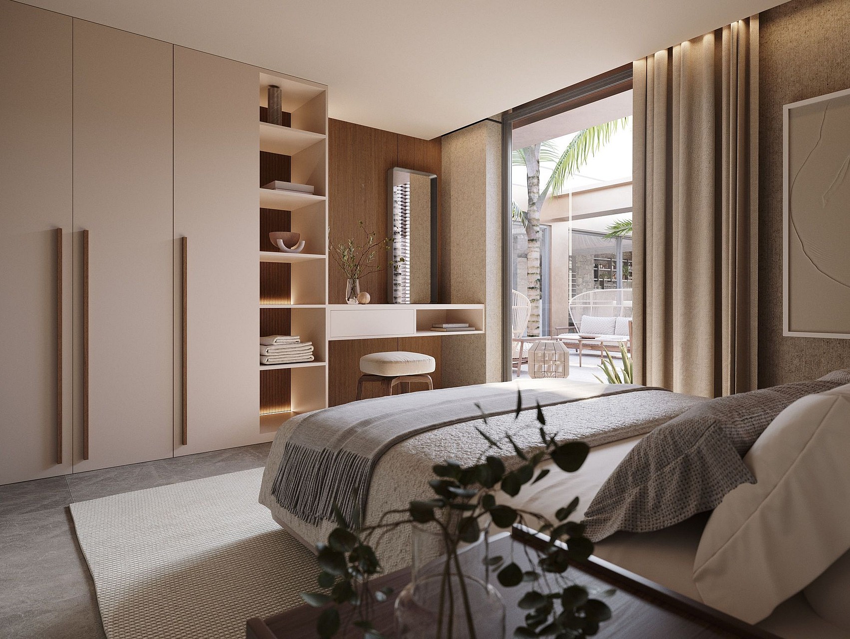 Modern bedroom with light beige built-in wardrobes, a floating vanity desk, and a view through glass doors to a terrace.