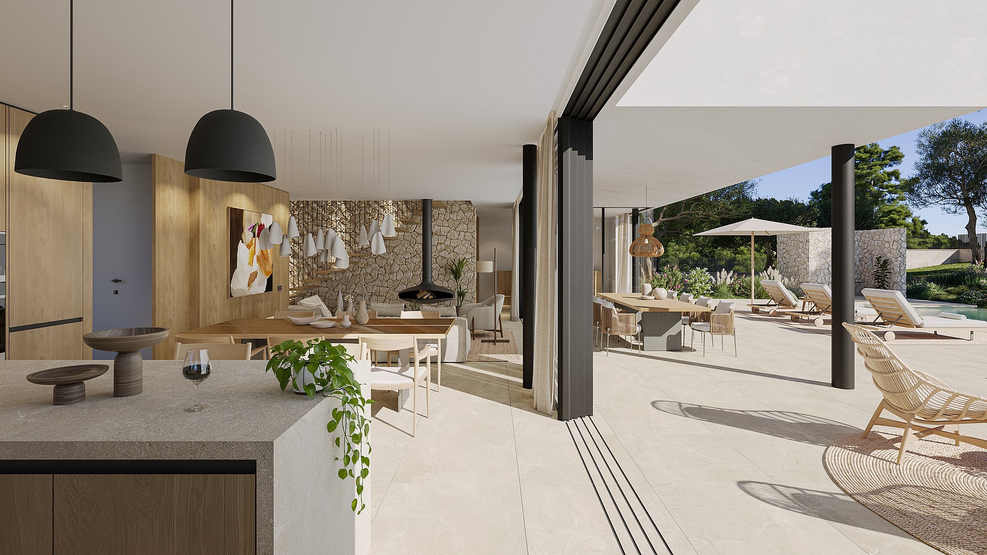 An open-plan kitchen and dining area with stone walls and sliding glass doors leading to a terrace with mountain views.