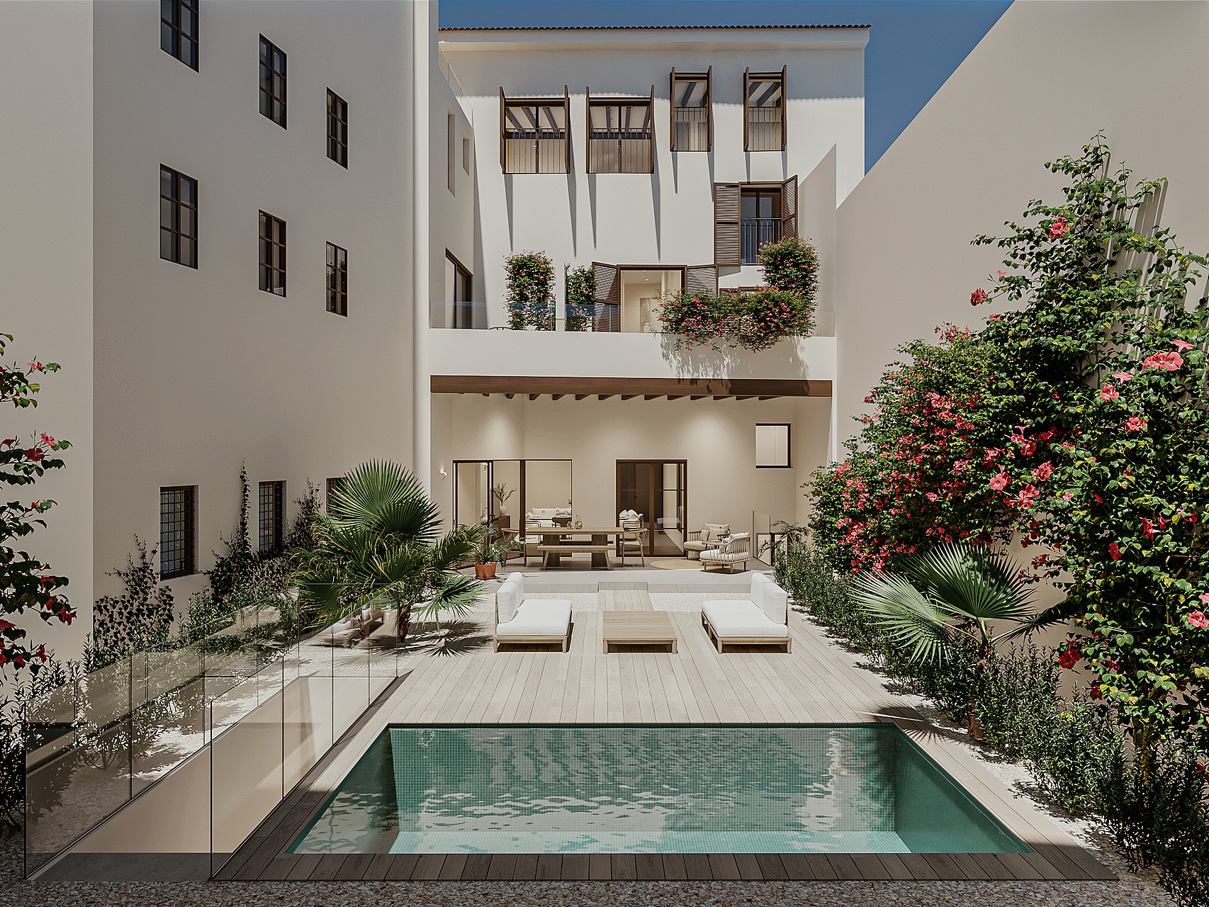 Exterior view of a private apartment courtyard featuring a small swimming pool, covered terrace, and white building facade.