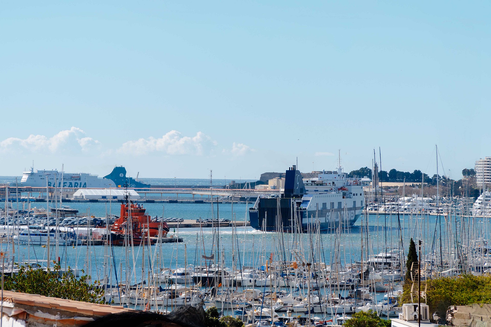 Blue sky in Mallorca with the sea and yacht harbour in Palma