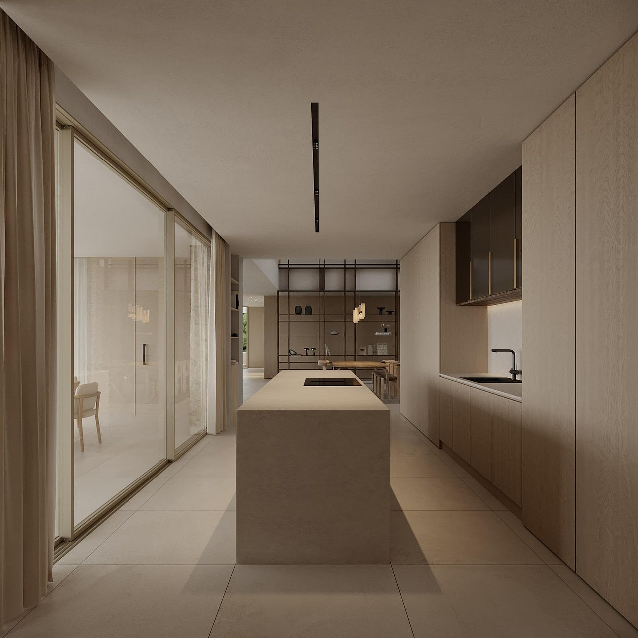 Open-plan kitchen with oak cabinetry and a central island