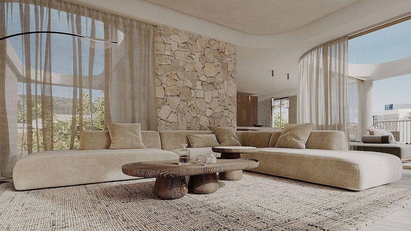 Modern living room with a large beige sectional sofa, a carved wood coffee table, and a feature wall made of round stone logs.