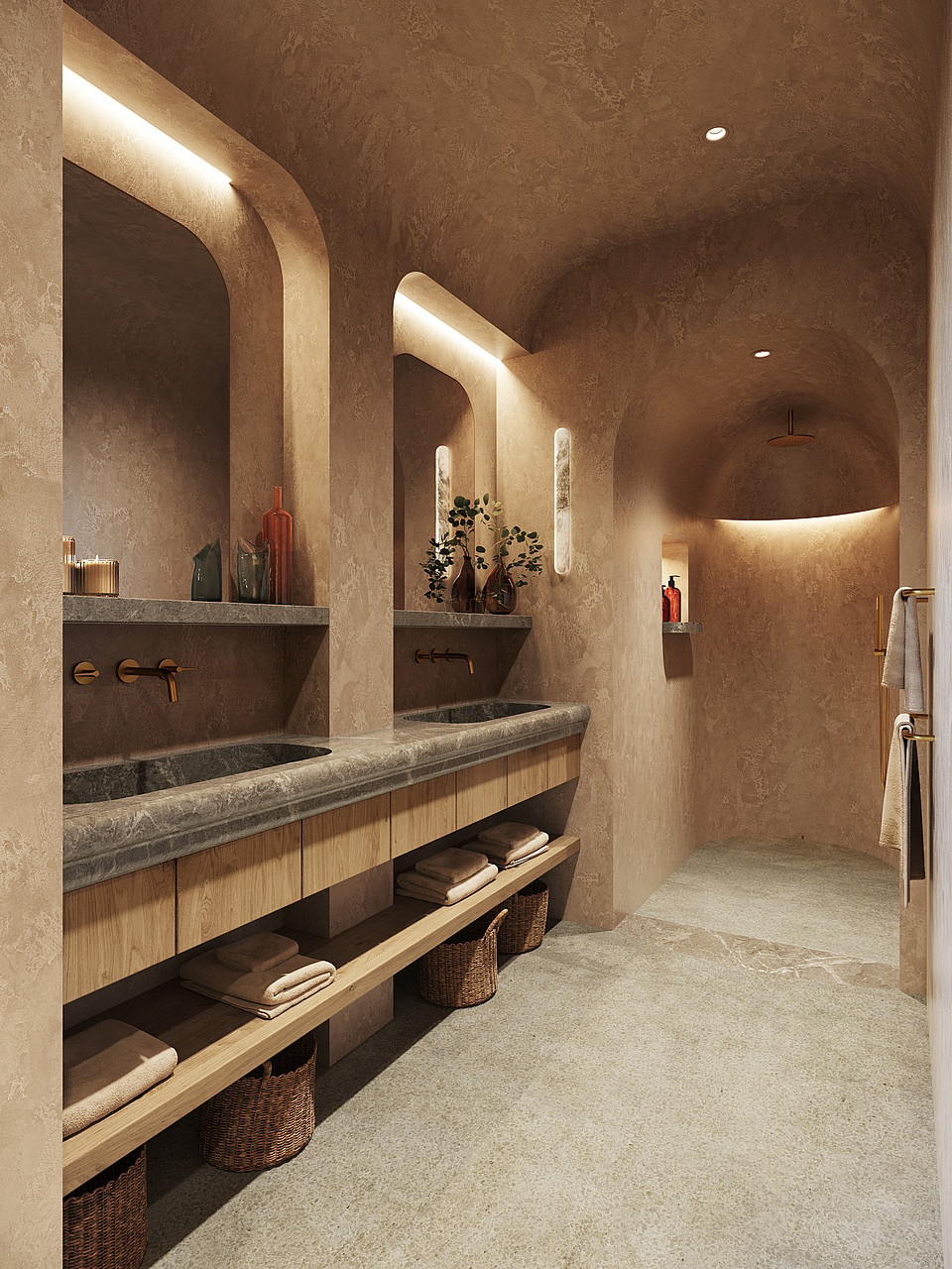 A master bathroom featuring a long stone vanity with double sinks, warm cove lighting, and an arched walk-in shower.