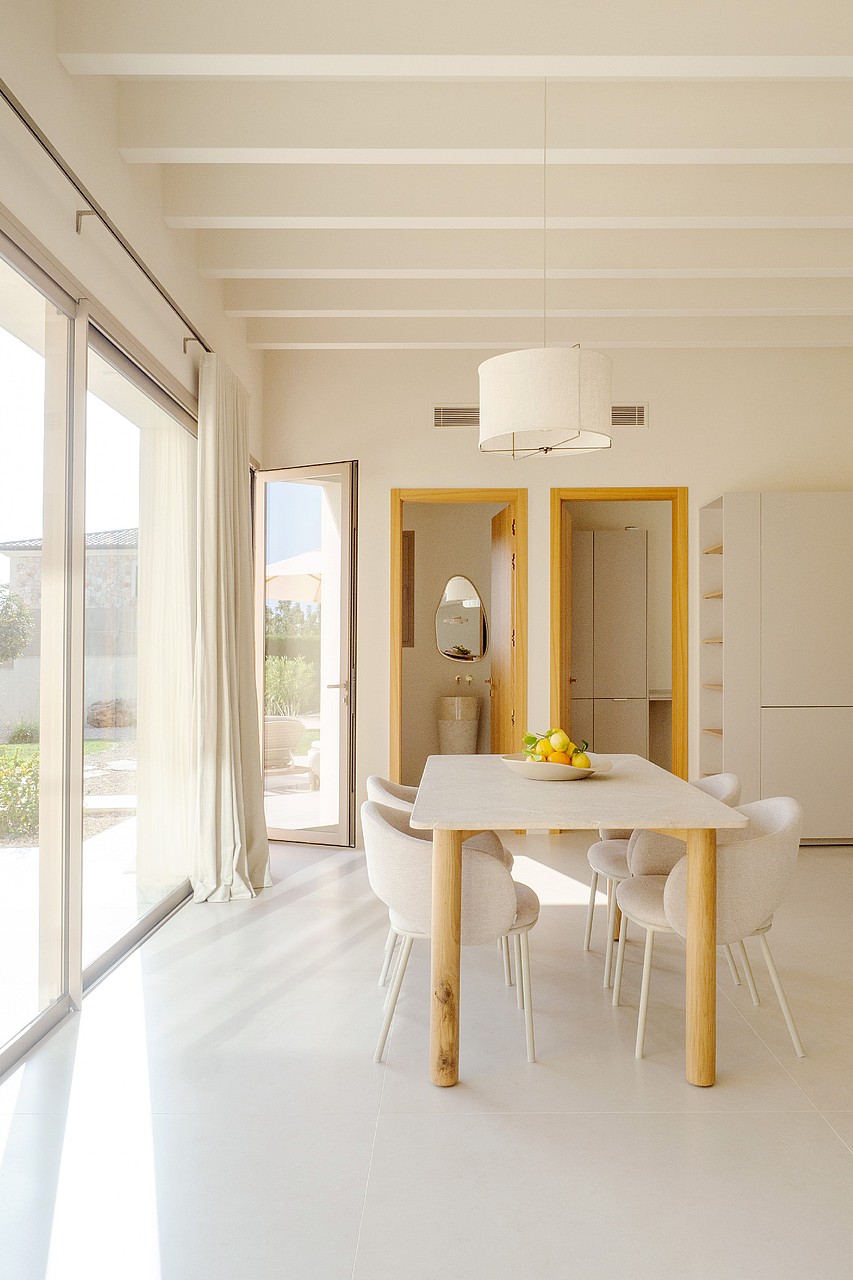 The ground floor features a spectacular open-plan living, dining, and kitchen area