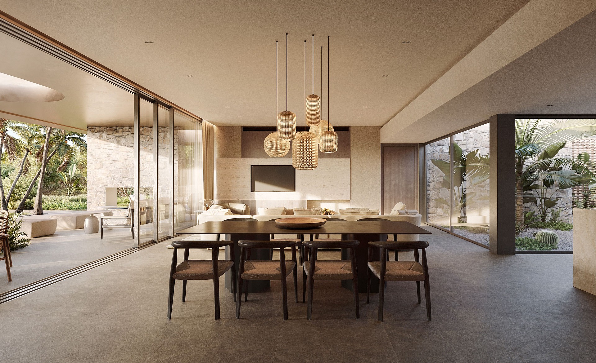 Dining room with long dark wooden table and woven chairs, glass walls opening to a lush garden, and a modern tiered chandelier.
