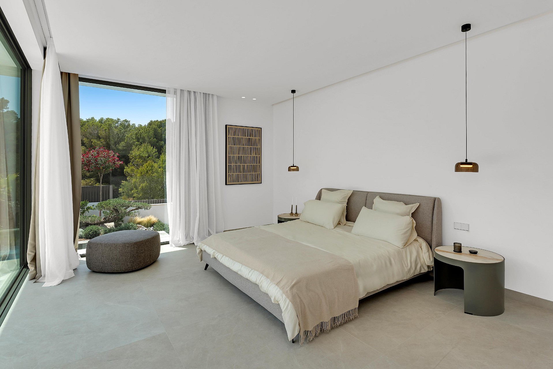 ight-filled en-suite bedroom with sliding glass door onto private terrace