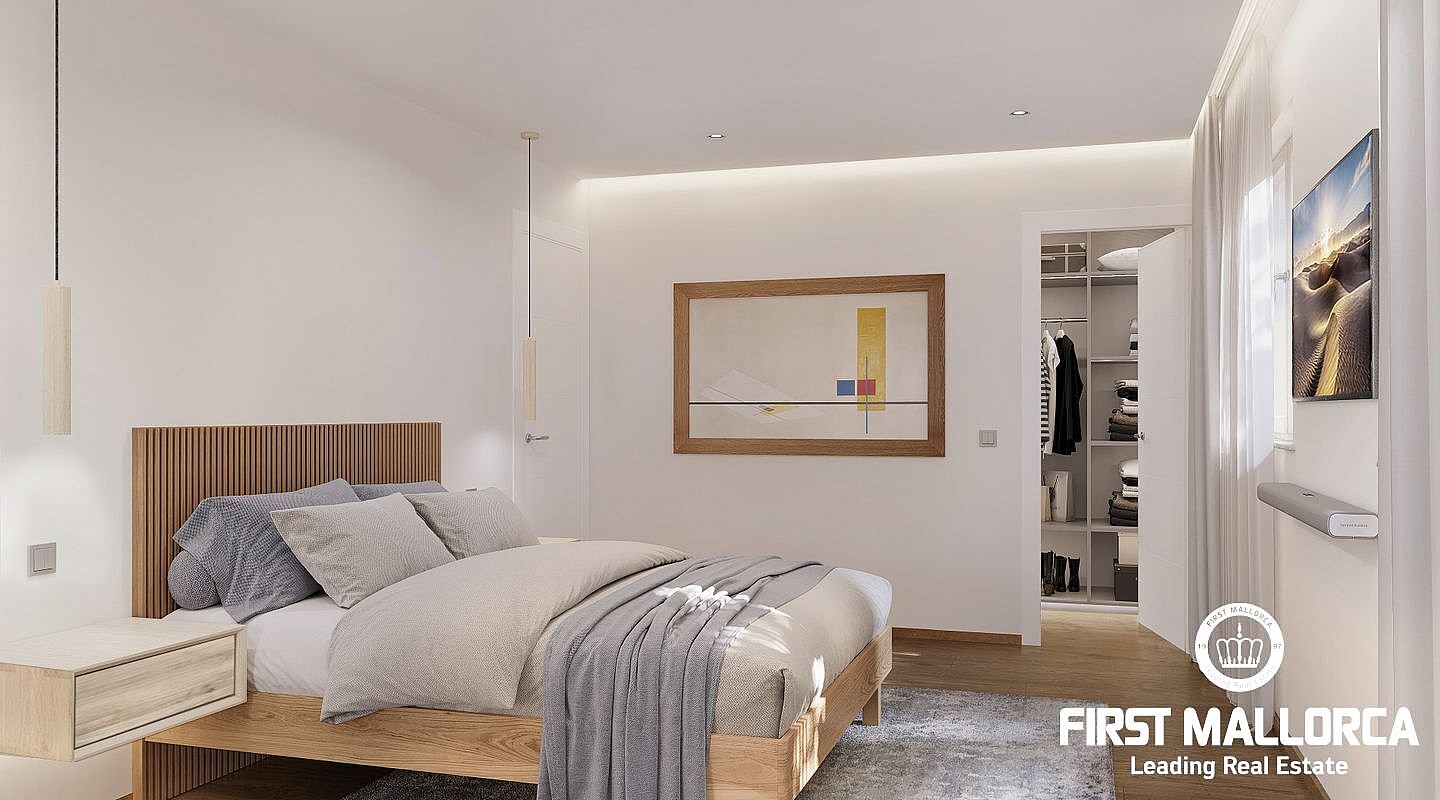 Modern bedroom featuring a wooden bed frame, textured wall art, and an open doorway leading to a walk-in wardrobe.