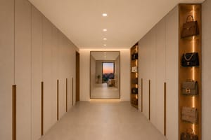 Interior design of walk.in closet from the principal bedroom of Son Dameto apartment Palma