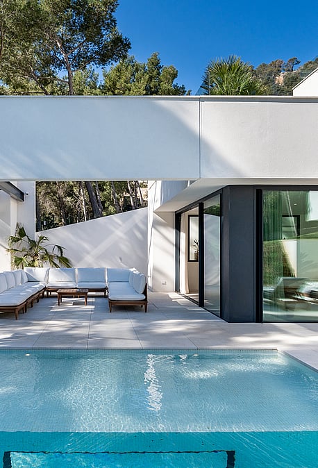 White render contemporary villa with 25-metre outdoor pool, teak loungers and landscaped garden in Son Vida, Mallorca