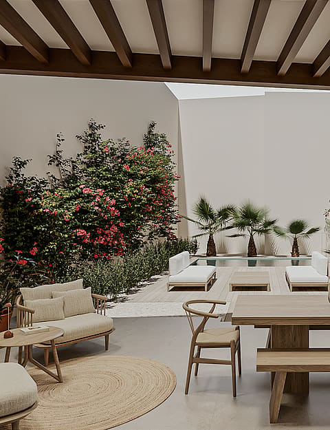 Covered outdoor porch with dining table, lounge seating and a beamed ceiling, opening to a timber deck, planted garden and private pool.