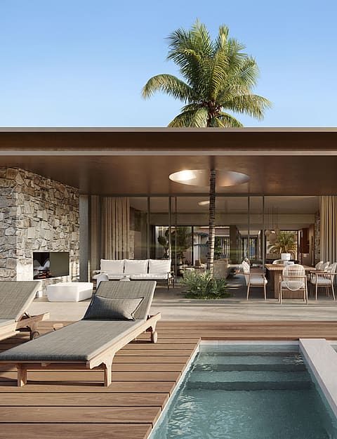 Contemporary villa terrace featuring a rectangular swimming pool, wooden decking, and stone-clad structural pillars.