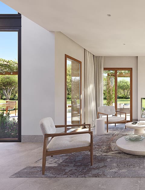 Render of a lounge with modular sofa, armchairs and a double-sided glass fireplace between terrace doors