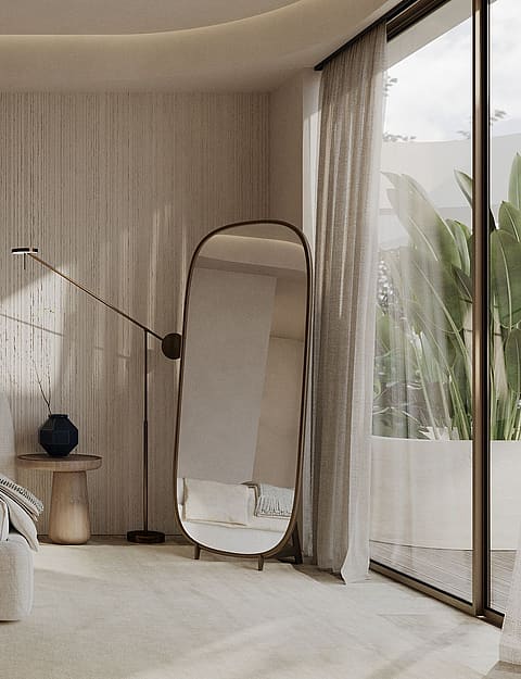 Modern bedroom with a central bed, vertical slat wall paneling, a large floor mirror, and floor-to-ceiling glass windows.
