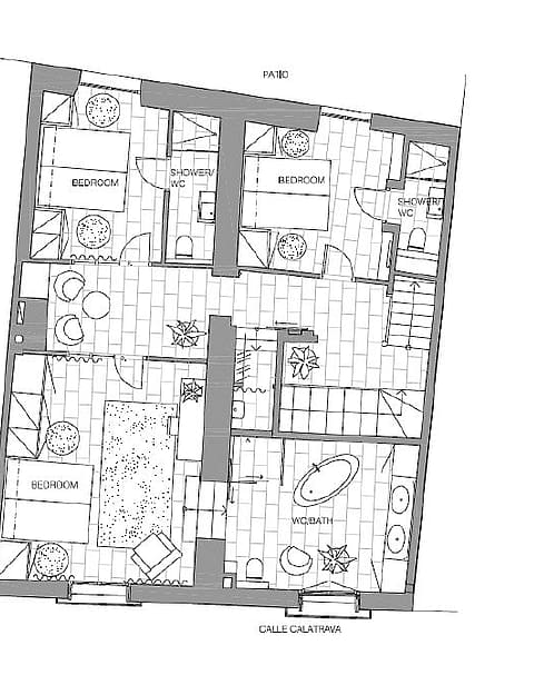 A two-dimensional black and white floor plan showing the layout and room dimensions of the townhouse property.