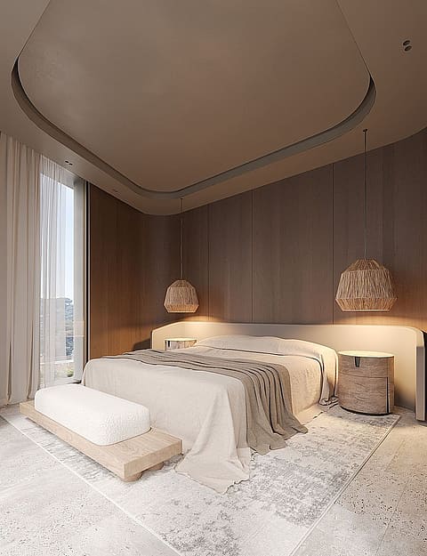 Modern bedroom with a white bed, beige bench, and textured wooden wall panels under a curved ceiling cove light.