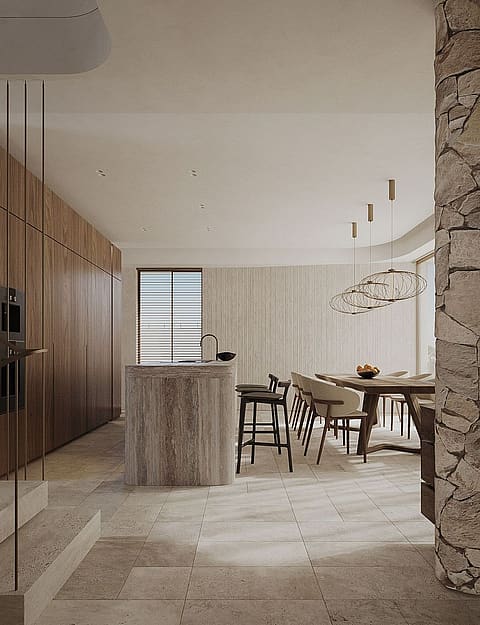 Contemporary kitchen featuring a fluted stone island, wooden cabinetry, and stone tiled flooring under warm recessed lighting.