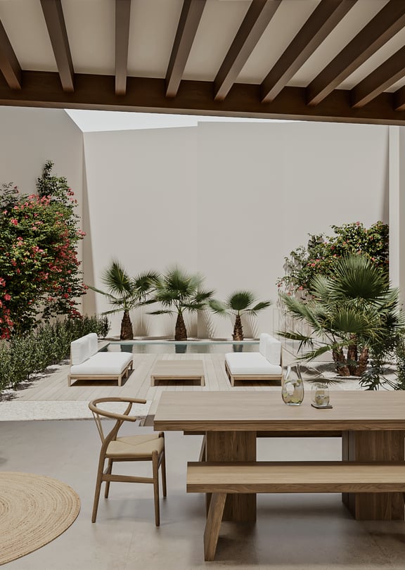 Covered outdoor porch with dining table, lounge seating and a beamed ceiling, opening to a timber deck, planted garden and private pool.