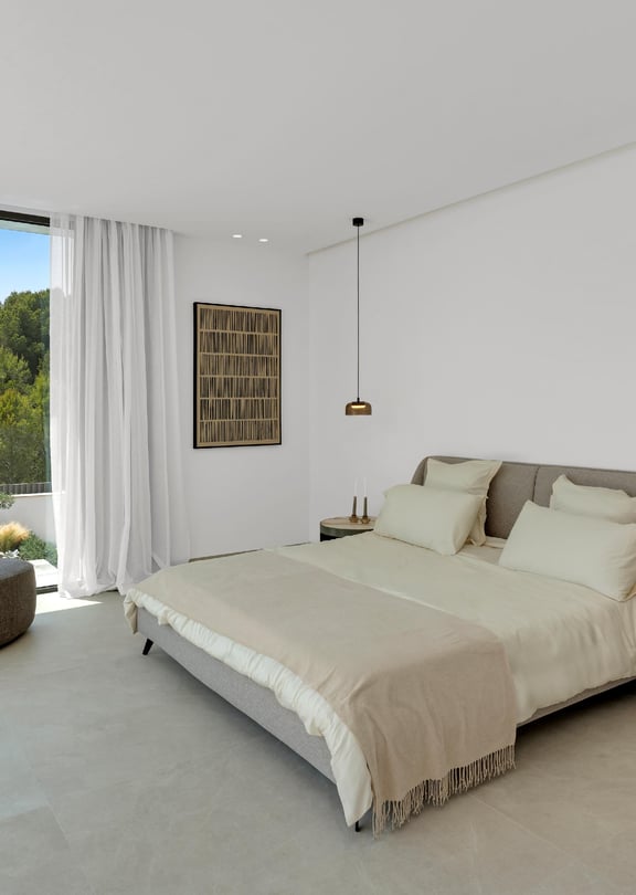 ight-filled en-suite bedroom with sliding glass door onto private terrace
