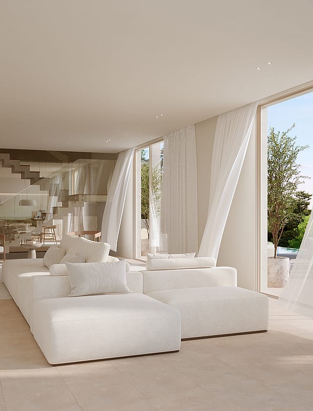 Bright open-plan living room featuring a white modular sofa, floor-to-ceiling windows, and a floating staircase.