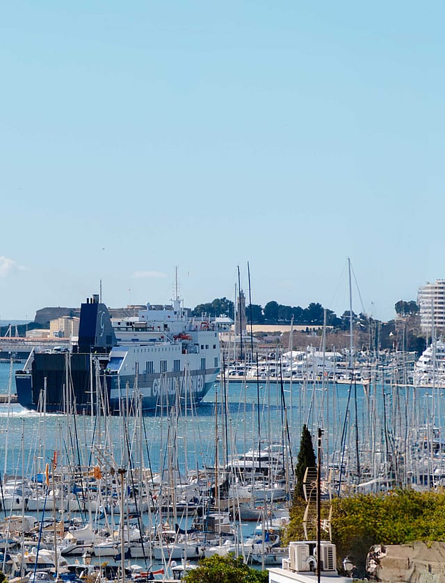 Blue sky in Mallorca with the sea and yacht harbour in Palma