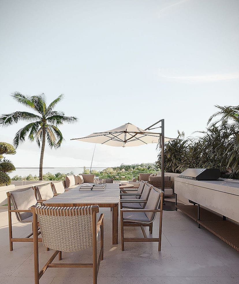 Rooftop terrace with a long outdoor dining table, woven chairs, a cantilever umbrella, and a stone prep area.