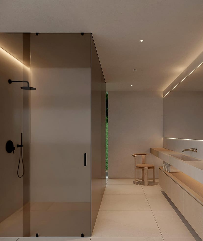 Ensuite bathroom with a smoked glass walk-in shower and stone vanity