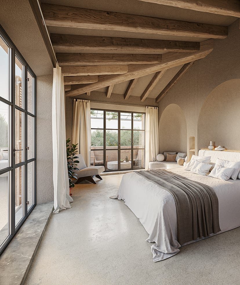 Spacious bedroom with stone walls, wooden vaulted ceiling, and large metal-framed glass doors opening to a terrace.