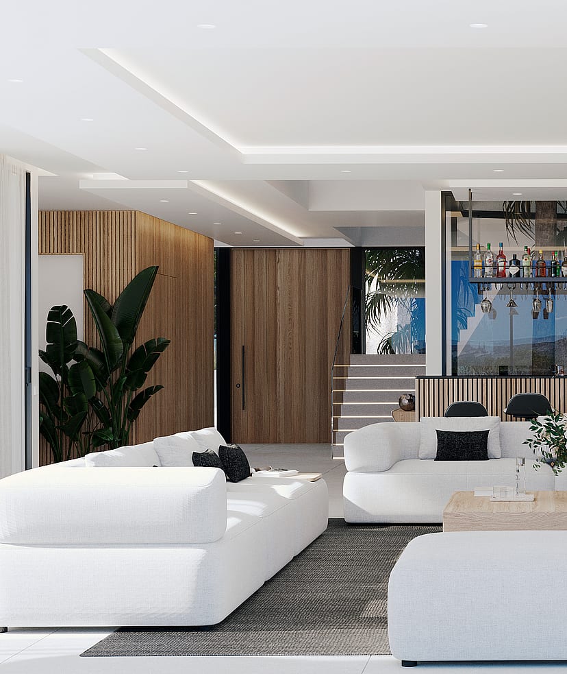 Spacious living room featuring white modular sofas, a central coffee table, and a dedicated bar area with glass shelving and wood-paneled walls.