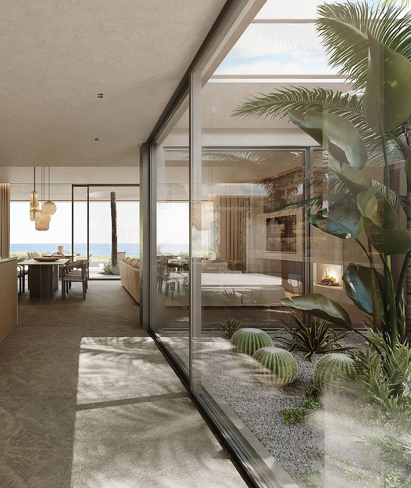 Modern open-plan kitchen featuring a white marble island, light wood cabinetry, and a glass-enclosed interior courtyard.