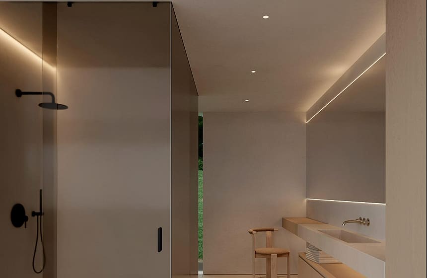 Ensuite bathroom with a smoked glass walk-in shower and stone vanity