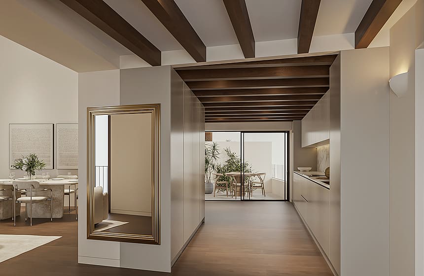 Open-plan kitchen with pale bespoke cabinetry and marble splashback beside a dining table, glazed doors to an interior terrace, exposed timber beams overhead.