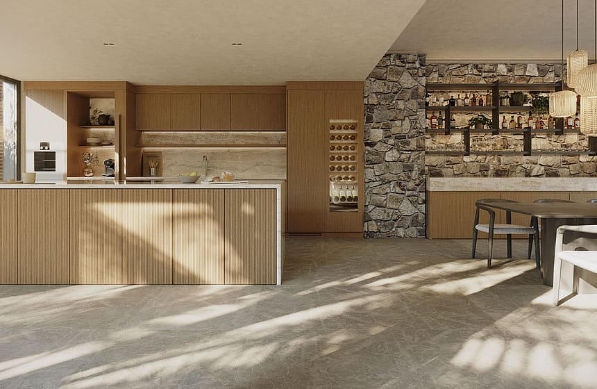 A modern open-plan kitchen featuring slatted oak cabinetry, stone floors, a textured stone feature wall, and a dining area.