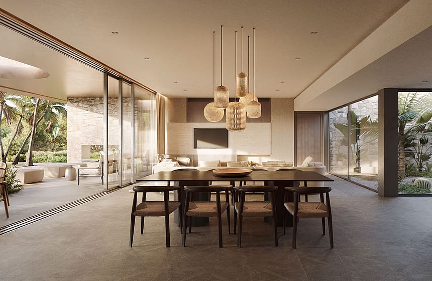Dining room with long dark wooden table and woven chairs, glass walls opening to a lush garden, and a modern tiered chandelier.