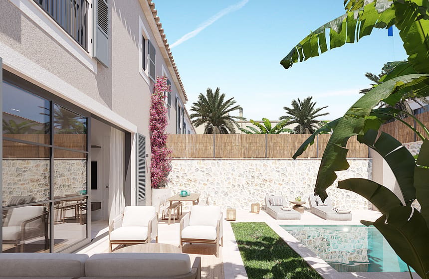 Piscine privée avec palmiers, terrasse couverte et jardin paysager derrière une maison à Palma