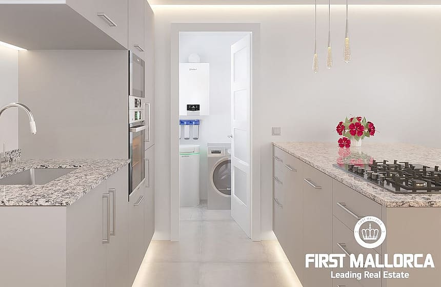 A contemporary galley-style kitchen featuring granite countertops, light cabinetry, and an open doorway leading to a utility area.