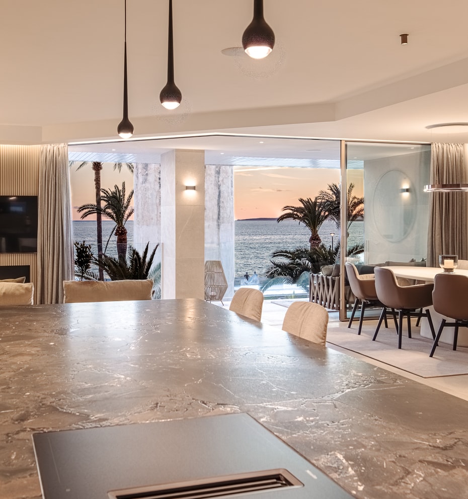 Kitchen island of the designer apartment in Portixol, Palma