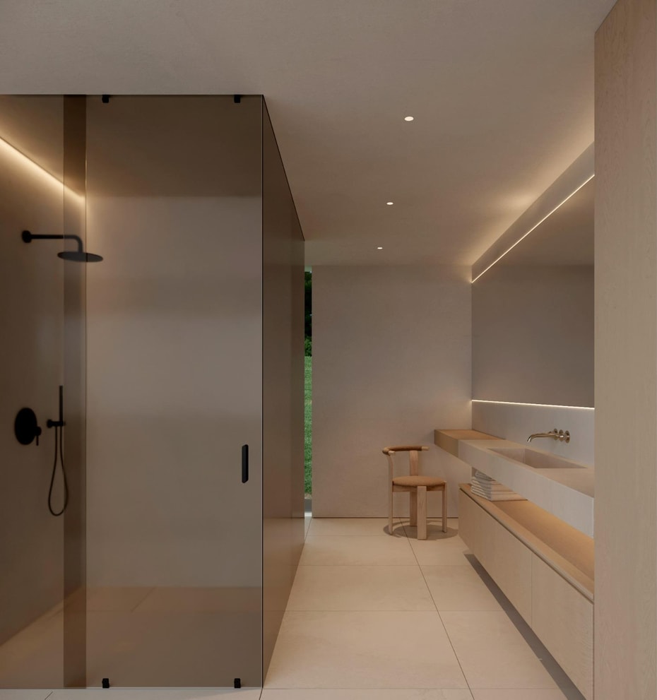 Ensuite bathroom with a smoked glass walk-in shower and stone vanity
