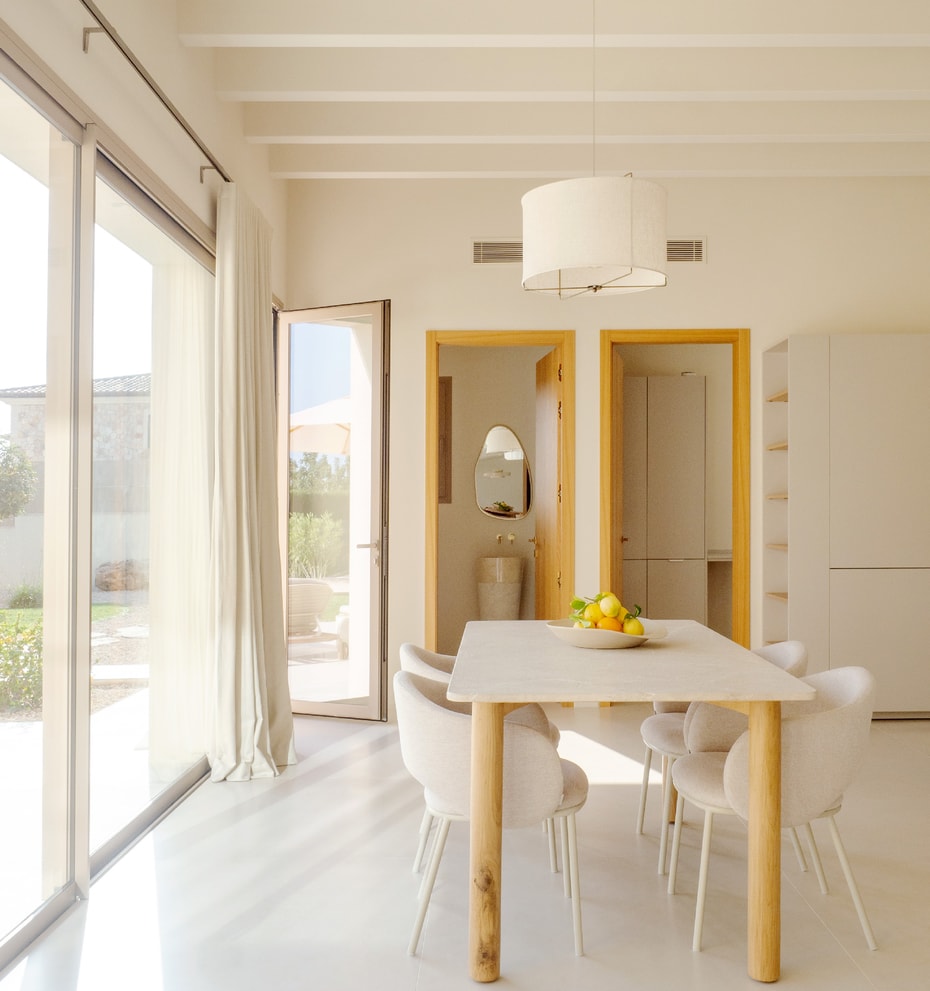 The ground floor features a spectacular open-plan living, dining, and kitchen area