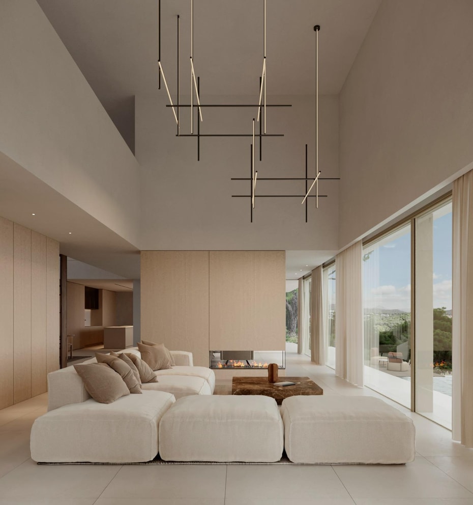 Double-height living room with a suspended fireplace and pool views